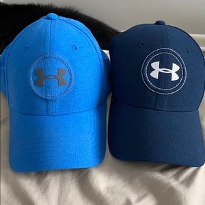 Two under Armour golf hats